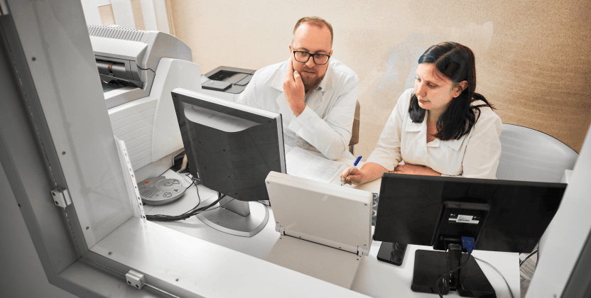 doctors checking information database on computers
